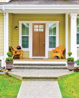 Modern fibreglass residential door with double, three-quarter sidelites