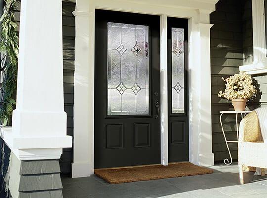 Black front door with half-glass insert with single right sidelite