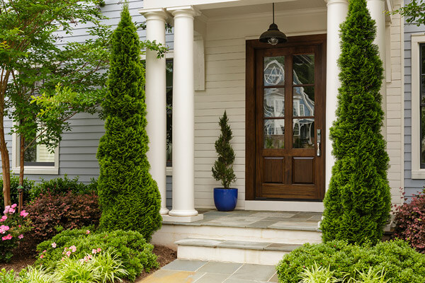 Chestnut-finished wooden front door with stunning glass inserts